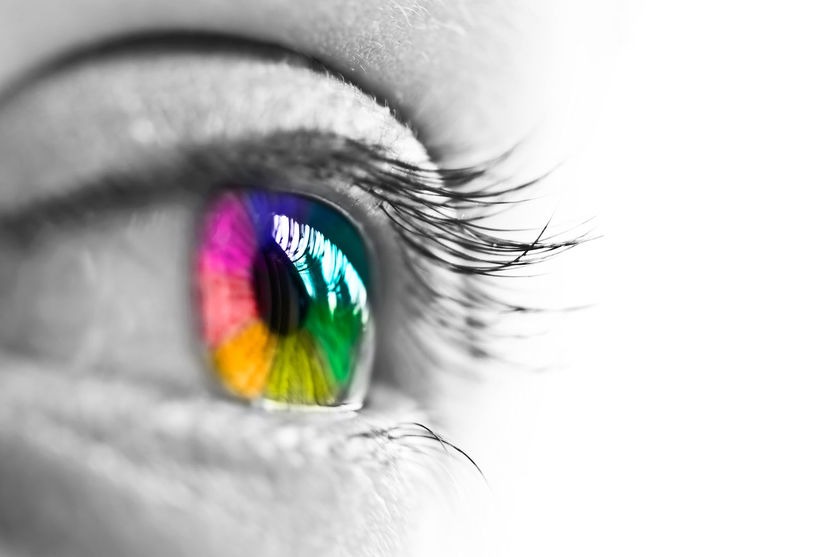 32988581 – girl colorful and natural rainbow eye on white background